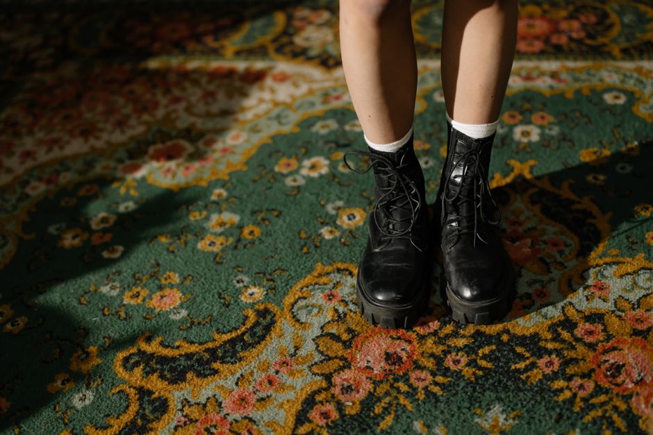 Ankle boots paired with a dress